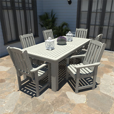 White Lehigh dining set on paved stone patio. 
