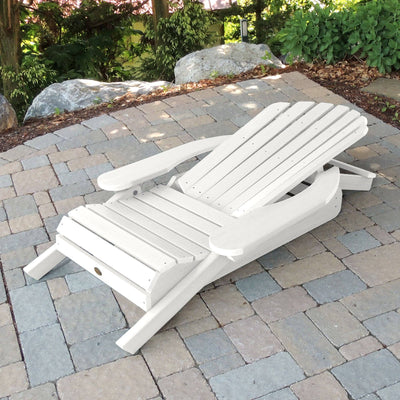Folded Hamilton Adirondack chair in White on stone