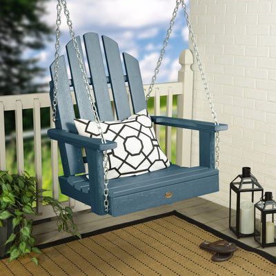 Light blue Single Seat Westport Swing on porch with pillow
