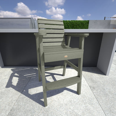 Light green Weatherly Bar Height Chair in outdoor kitchen