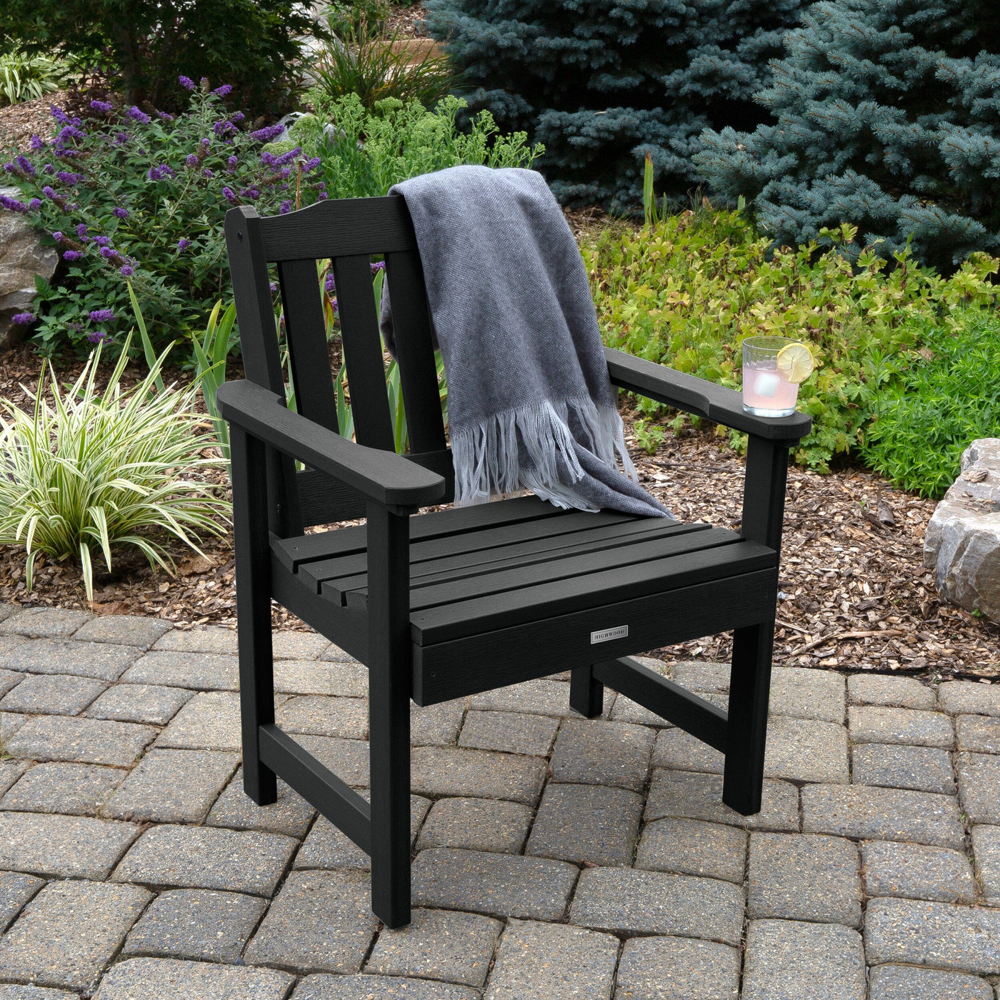 Front view of black Lehigh garden chair with blanket