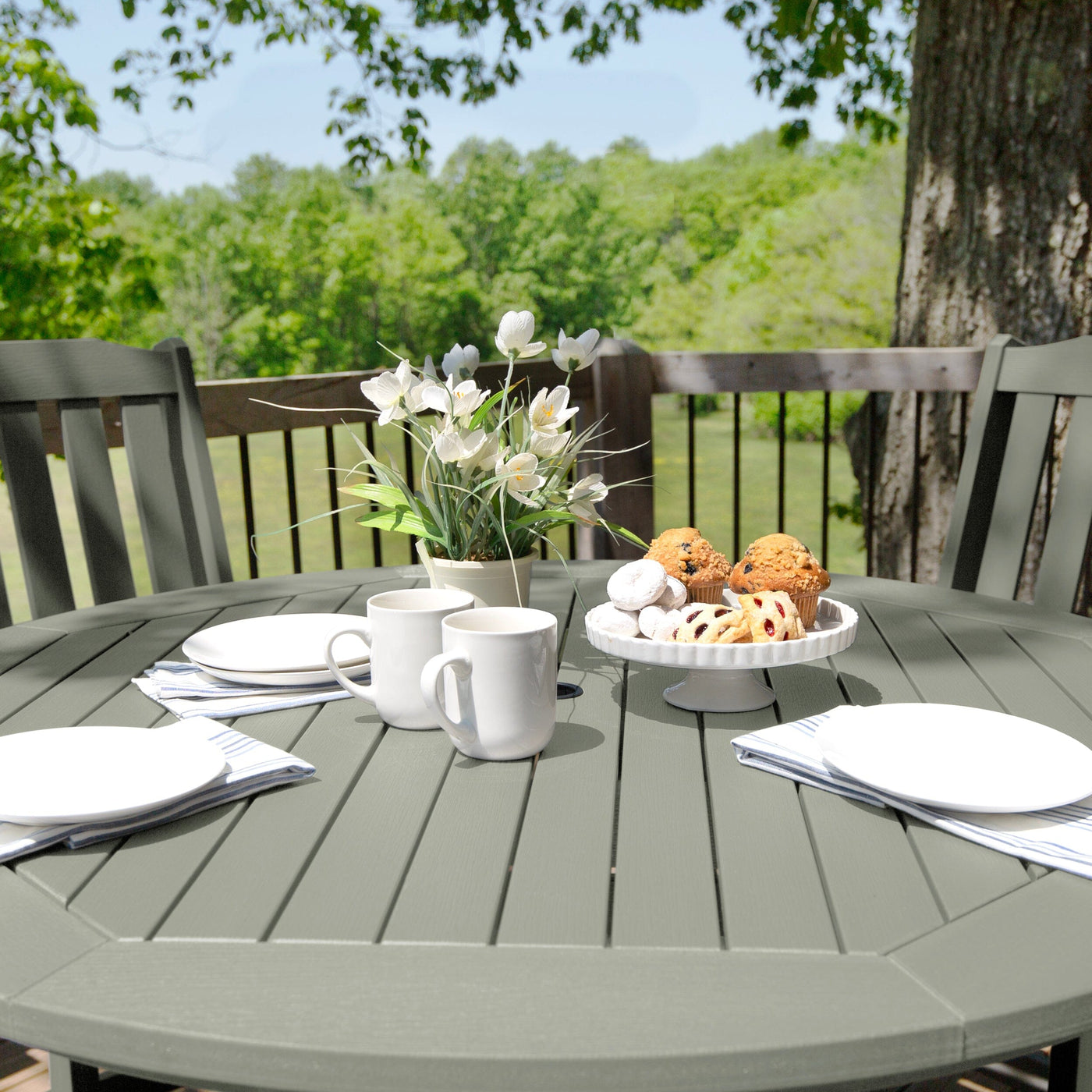 Beige/gray round dining set on deck