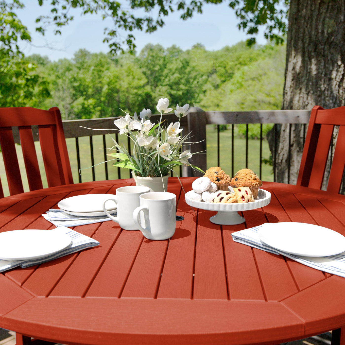 Red round dining set with place settings