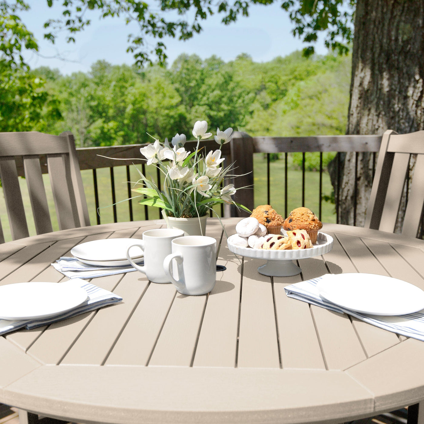 Beige round dining set with place settings