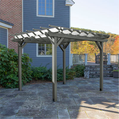 Gray Bodhi 10' x 10' Pergola with house in the background.