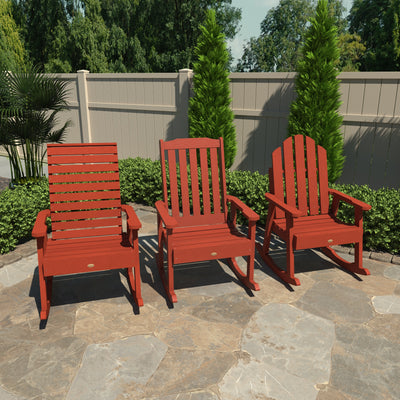 Red Weatherly, Lehigh, and Westport Garden rocking chairs on a stone patio. 