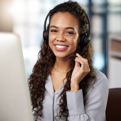 Woman in customer service with headset. 