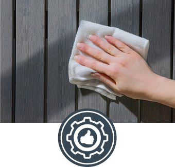 Hand cleaning a poly lumber surface with a cloth, featuring a thumbs-up icon.