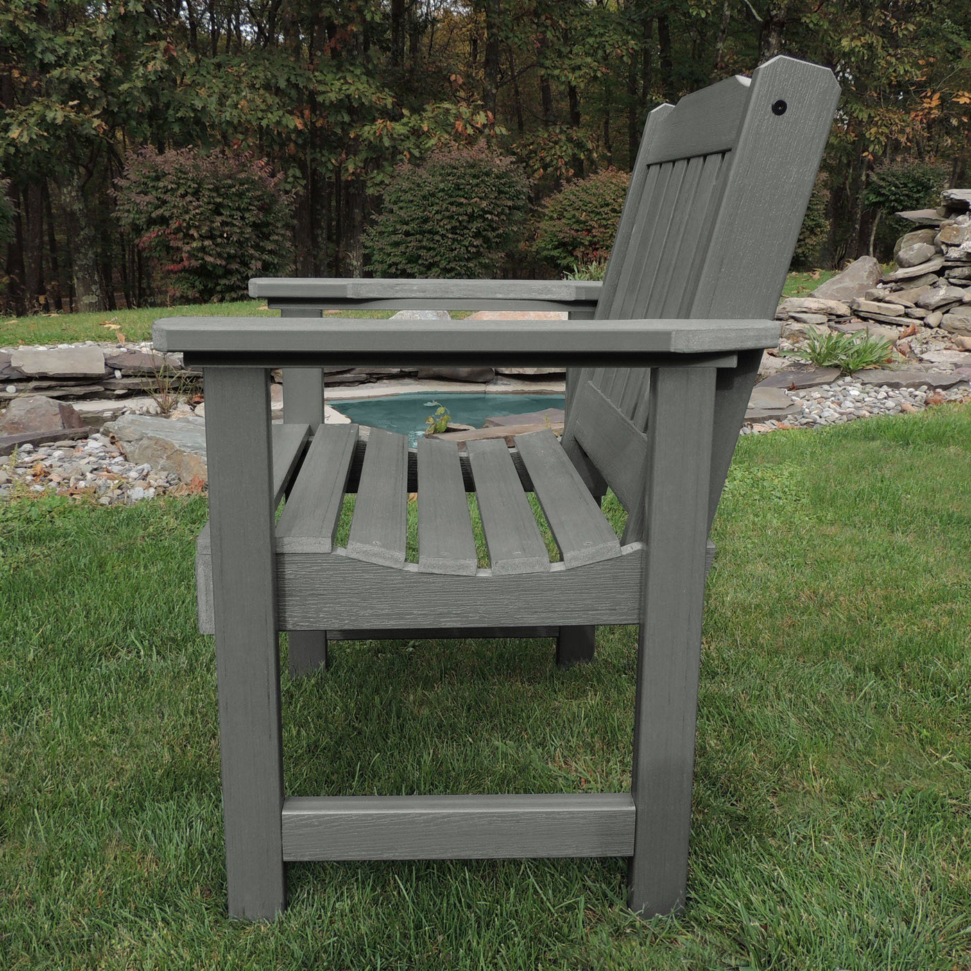Chair on patio with flowers