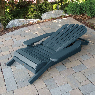 Folded Hamilton Adirondack chair in Nantucket blue on stone