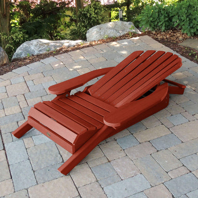 Folded Hamilton Adirondack chair in Rustic red on stone
