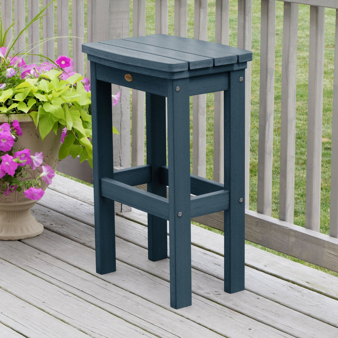 Nantucket Blue Lehigh bar height stool on deck with flowers 