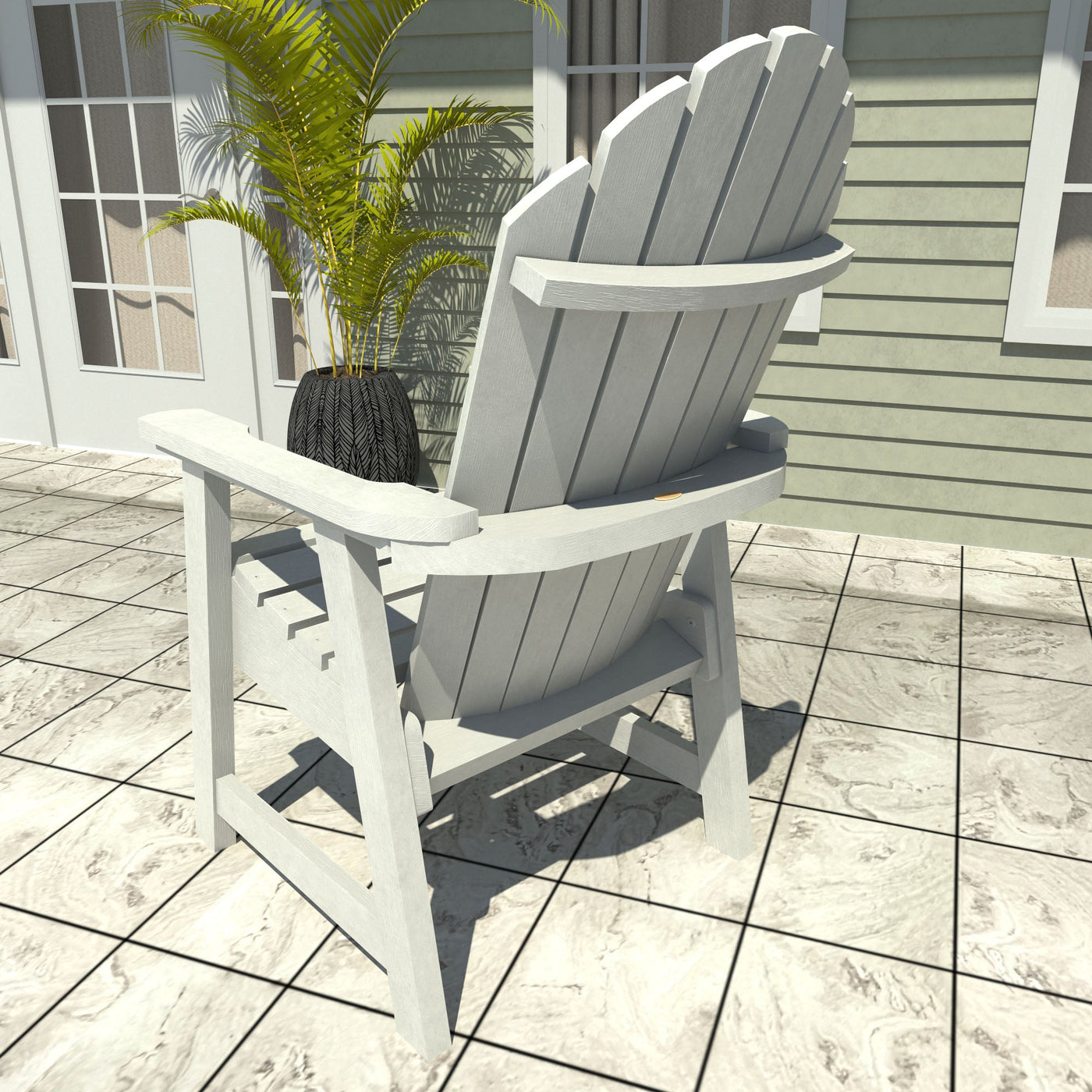 White Adirondack chair and table