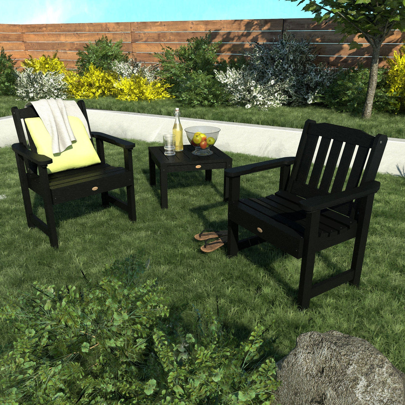 Outdoor seating set on lawn with table