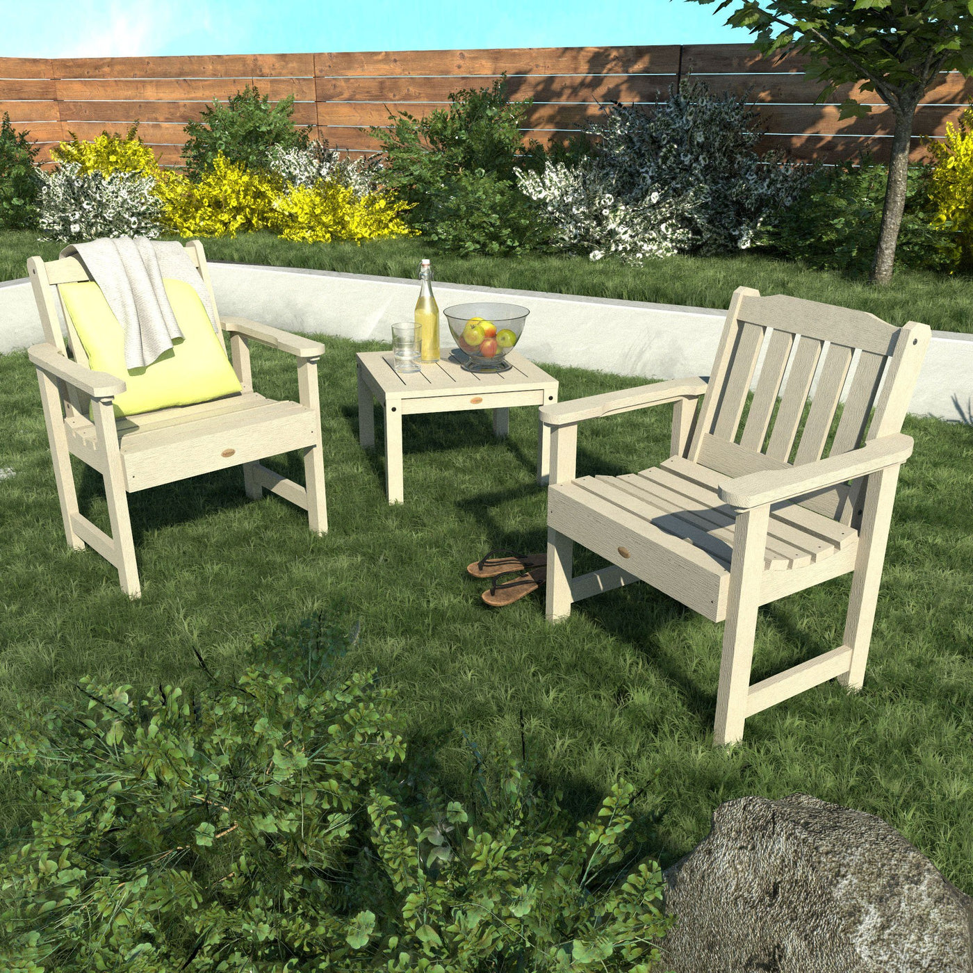 Two chairs and table on lawn