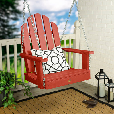 Red Single Seat Westport Swing on porch with pillow