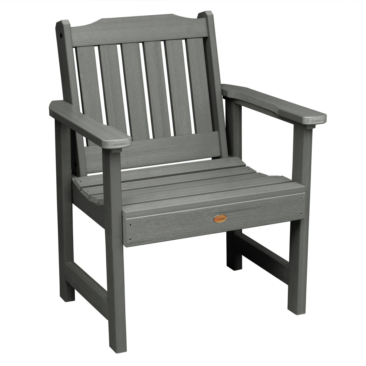 Three chairs with table on lawn